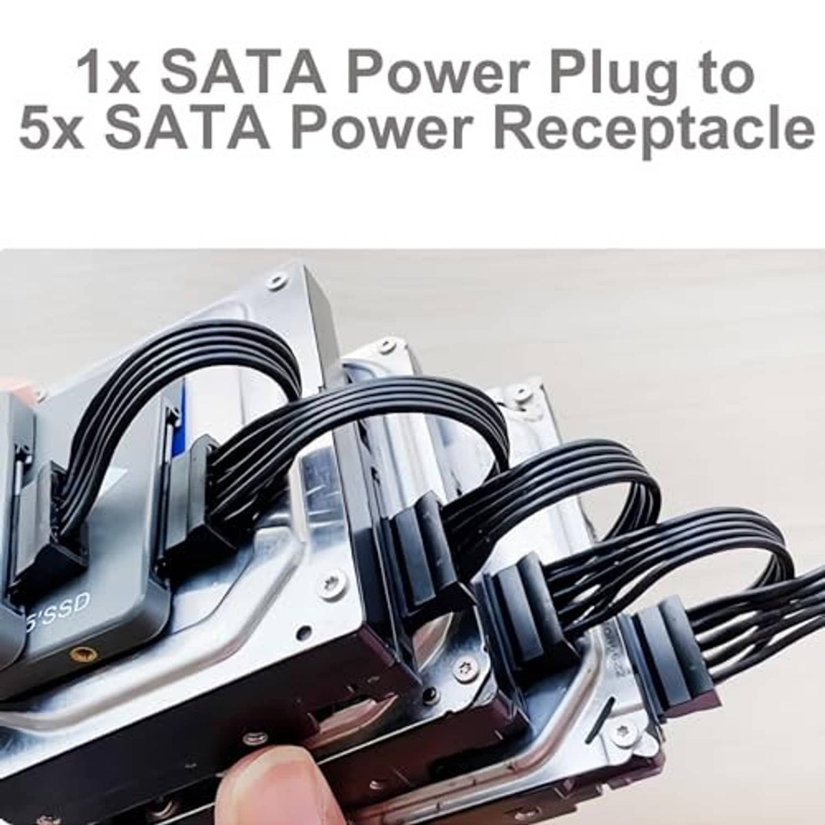 SATA power splitter cable with multiple plugs connected to a drive power port