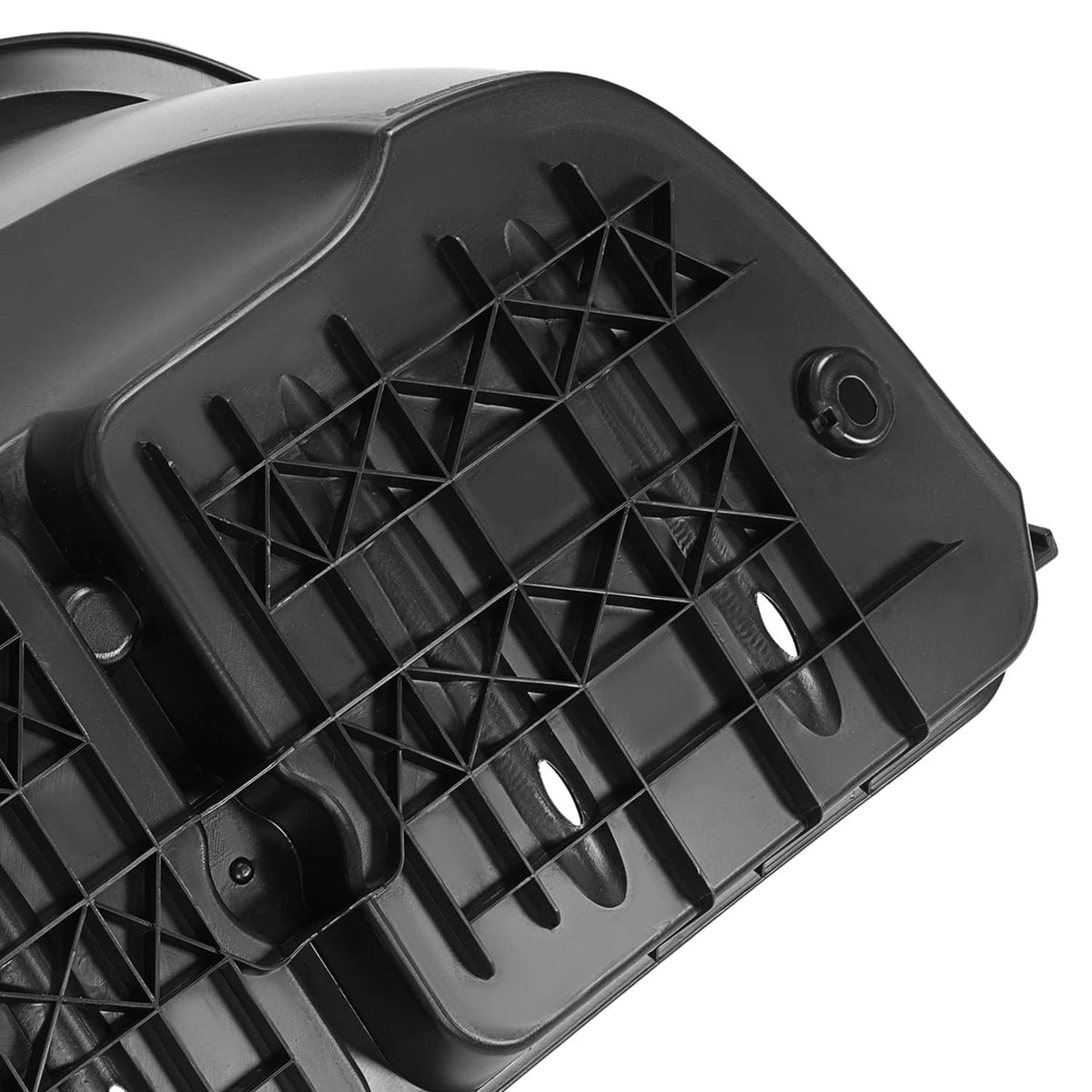 Close-up of black vented grid on rear bagwell liner with mounting hole