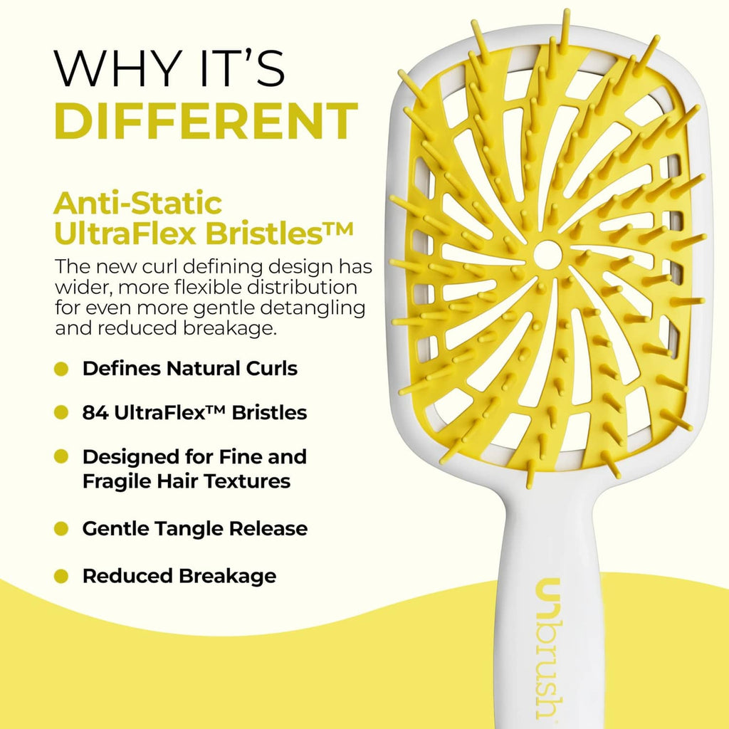 Anti-static detangling hair brush with yellow bristles and white cushioned head