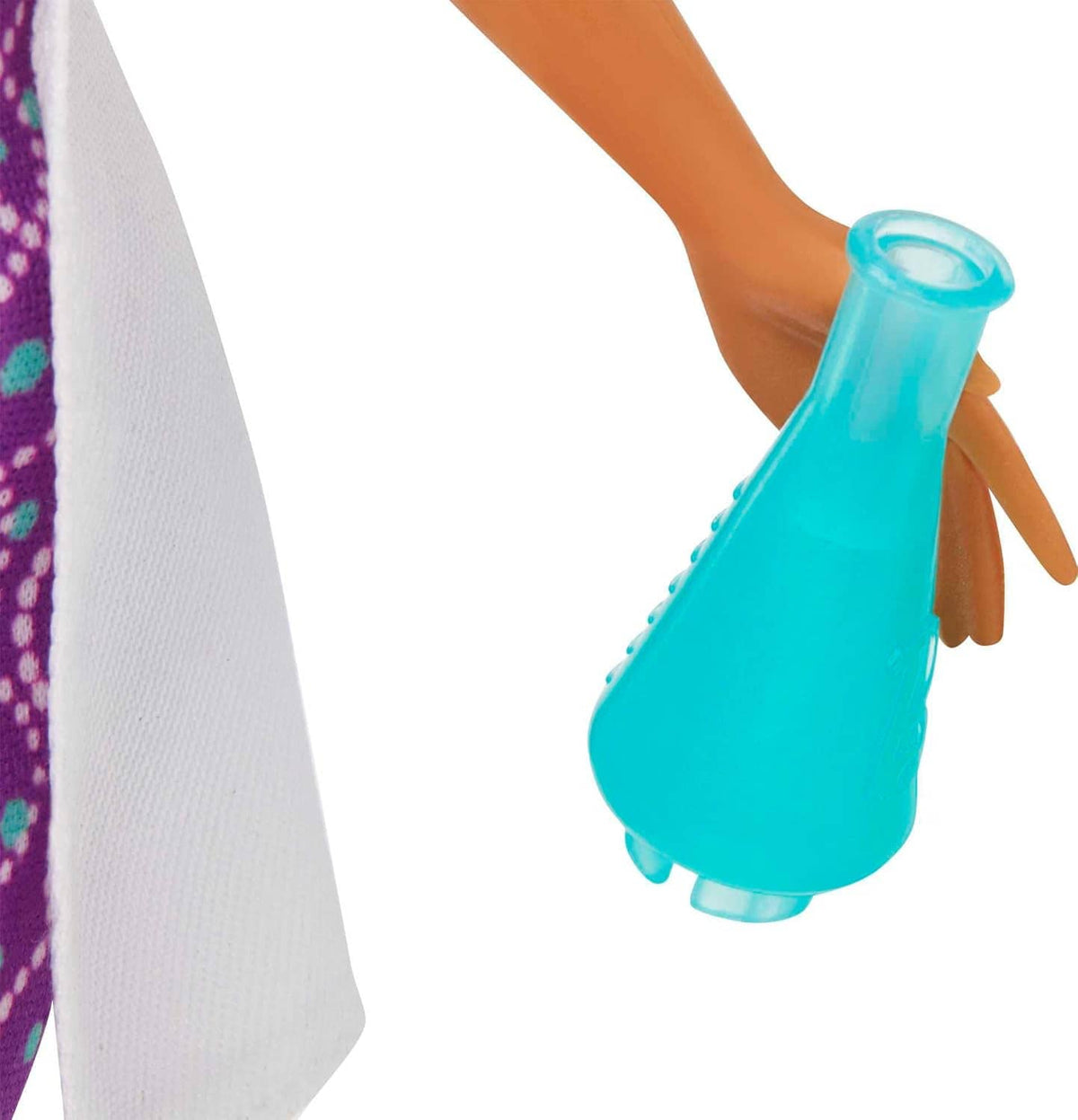 Blue lab flask with cap held by a doll arm; white lab coat sleeve