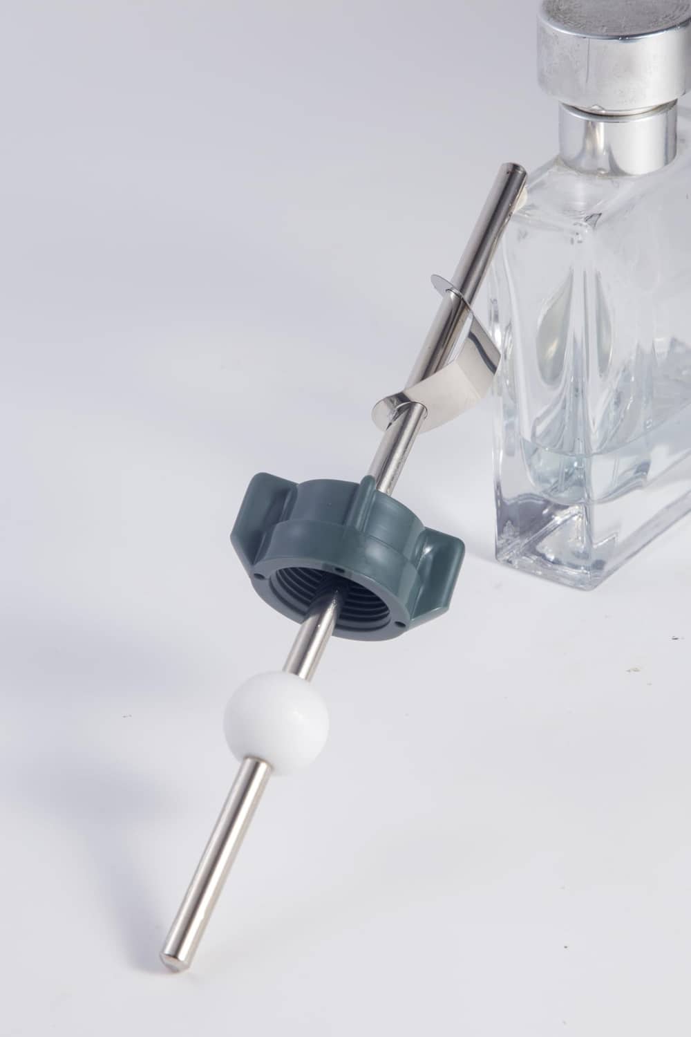 Chrome pop-up ball rod assembly with blue stopper and white ball