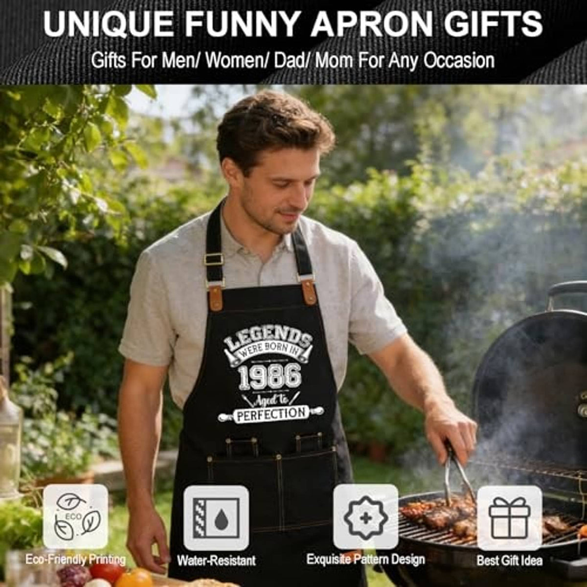 Black apron with printed 1986 design worn while holding a utensil near a grill.