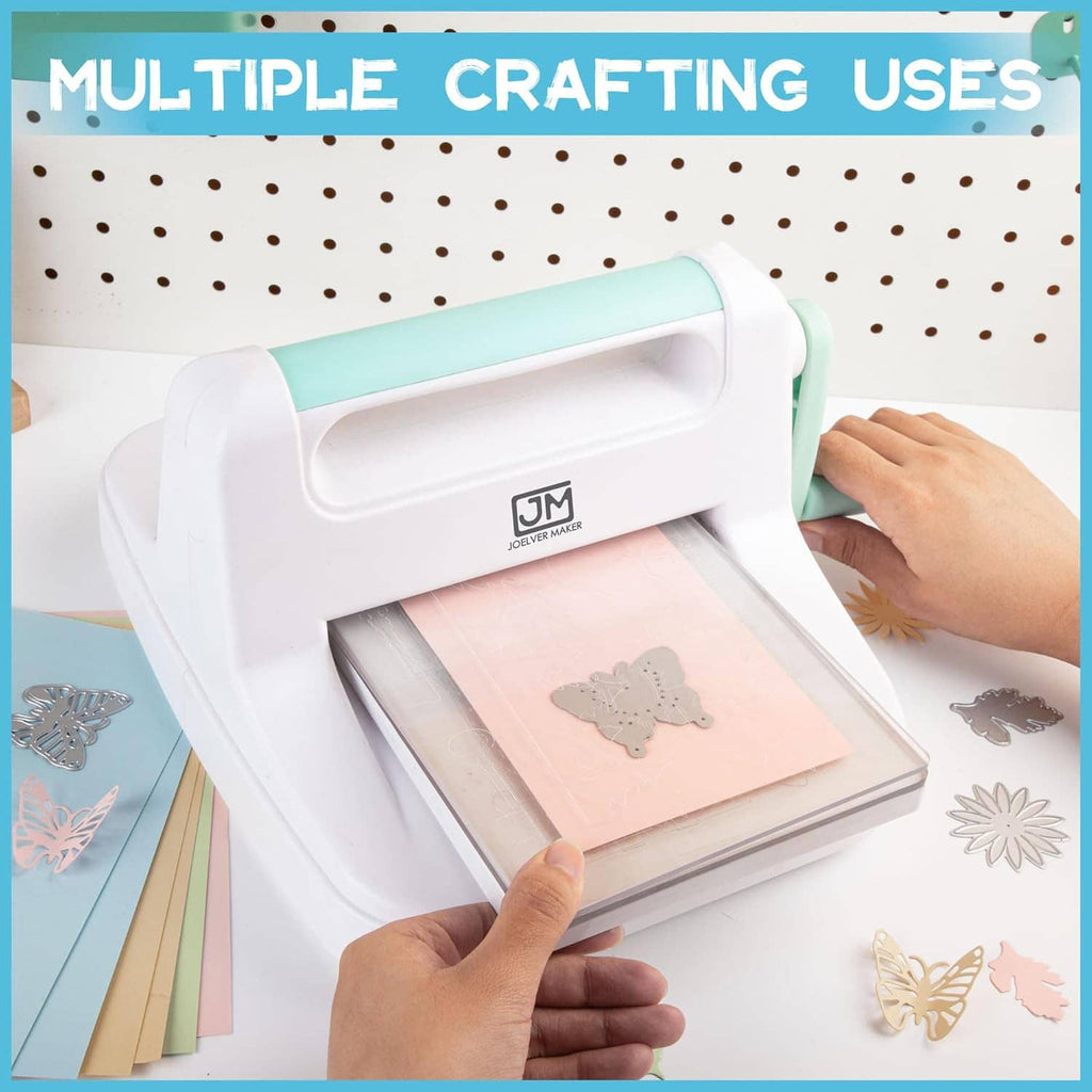 Manual die cutting and embossing machine with hand feeding cardstock into rollers