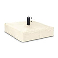 Beige umbrella base cover with center pole hole, fitted box-style fabric