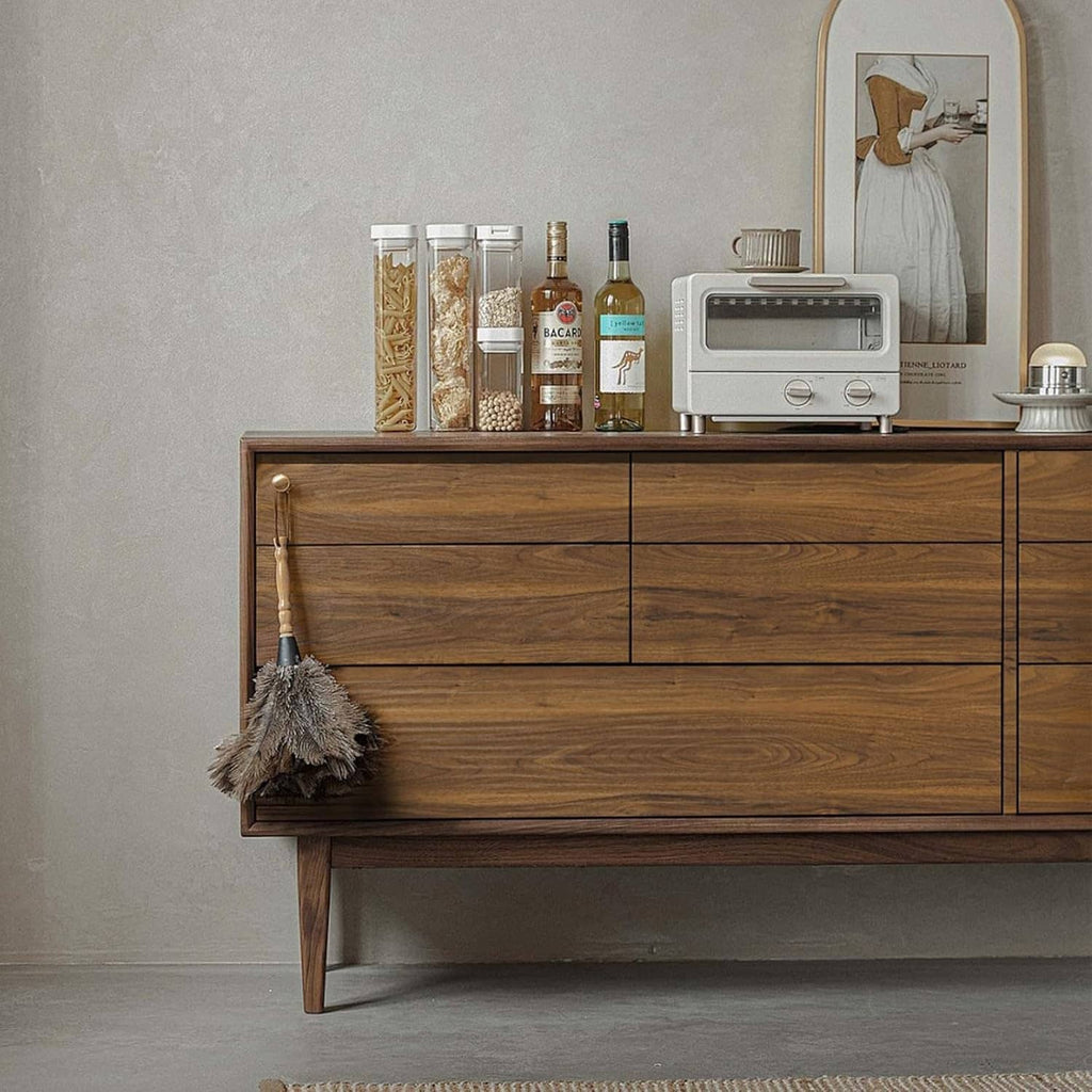 Wood grain contact paper covering a console cabinet with drawers and open storage shelf