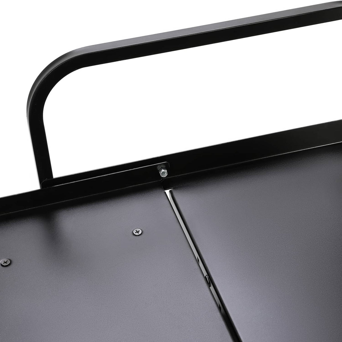 Close-up of black seat base panel with screws and support bar on folding frame