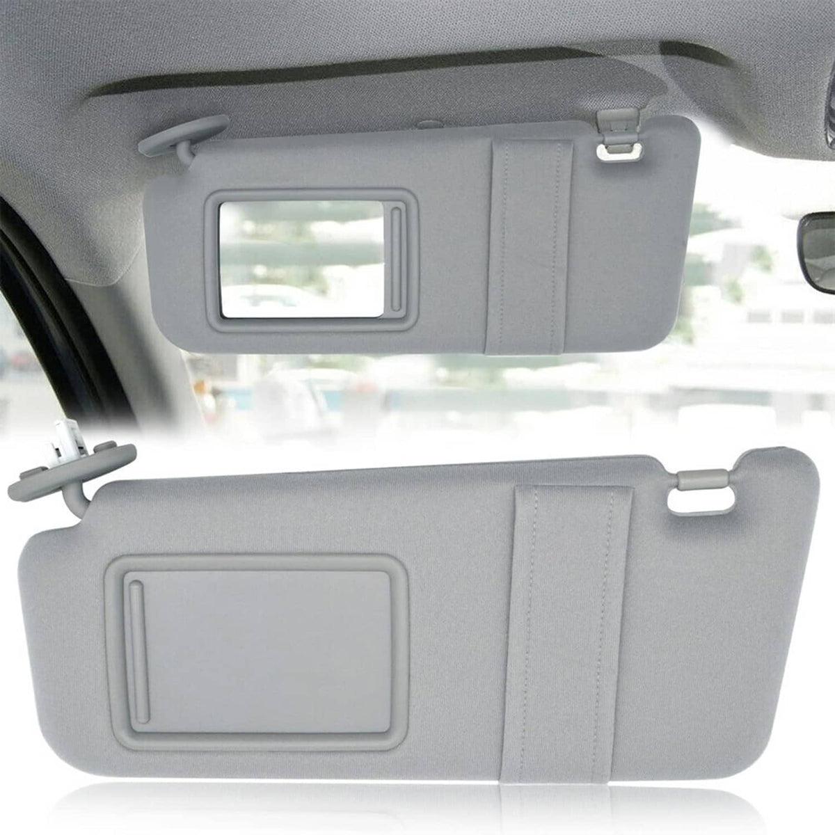 Pair of gray car sun visors with mirror cutouts and attached clips