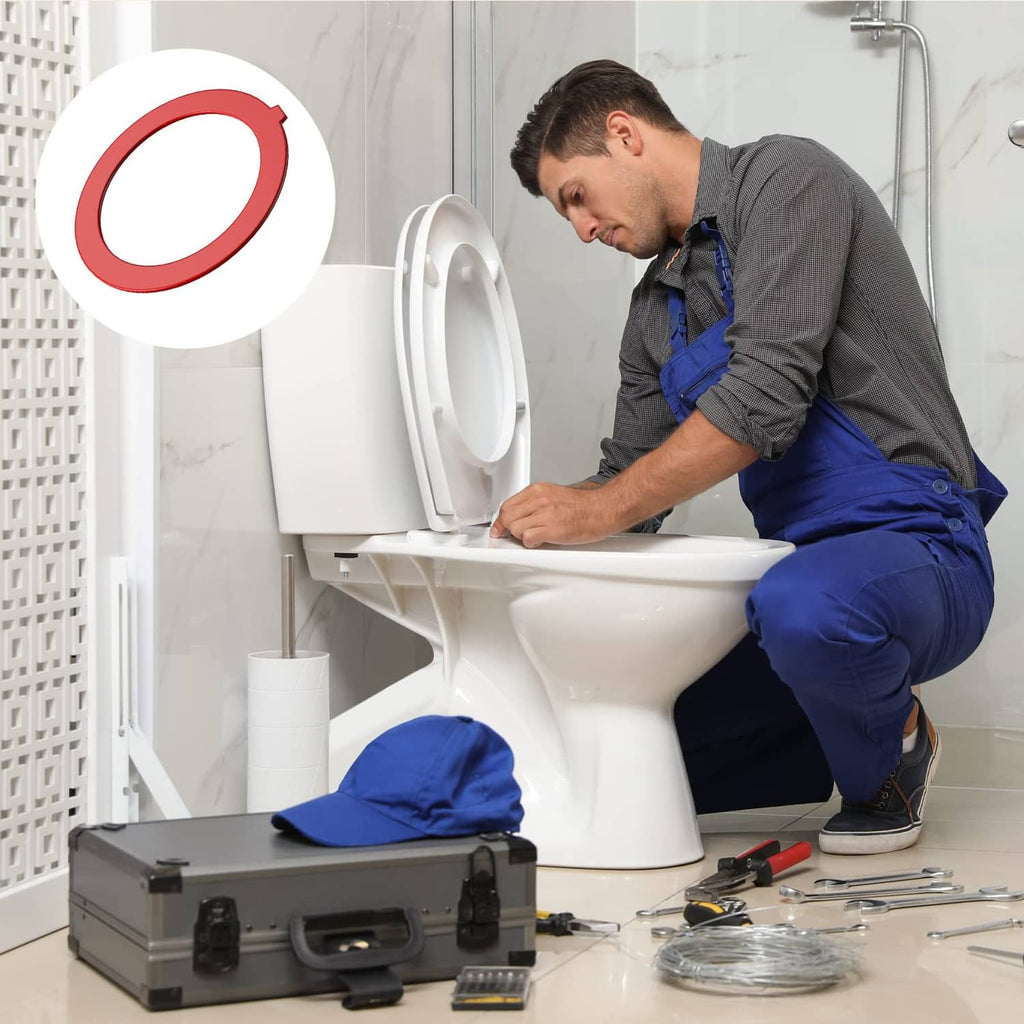 Red flush valve seal ring graphic above toilet during installation