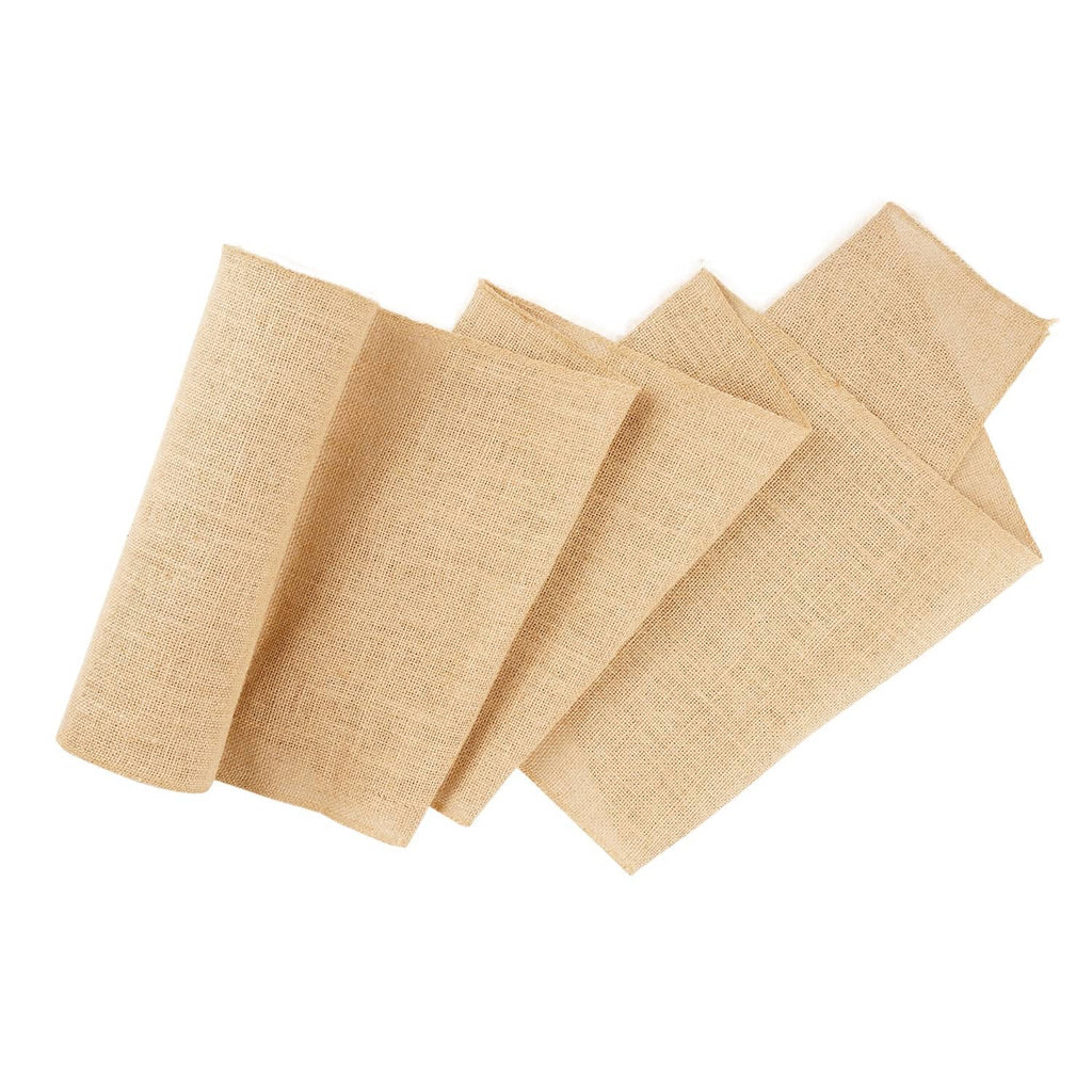 Natural burlap fabric strips stacked together, textured woven surface