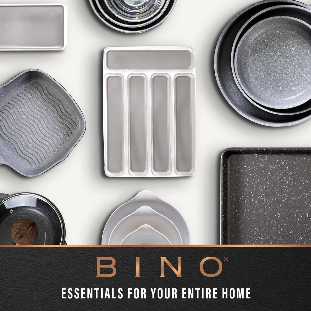 Natural woven plastic cutout-handle storage basket, shown among kitchen cookware and organizers