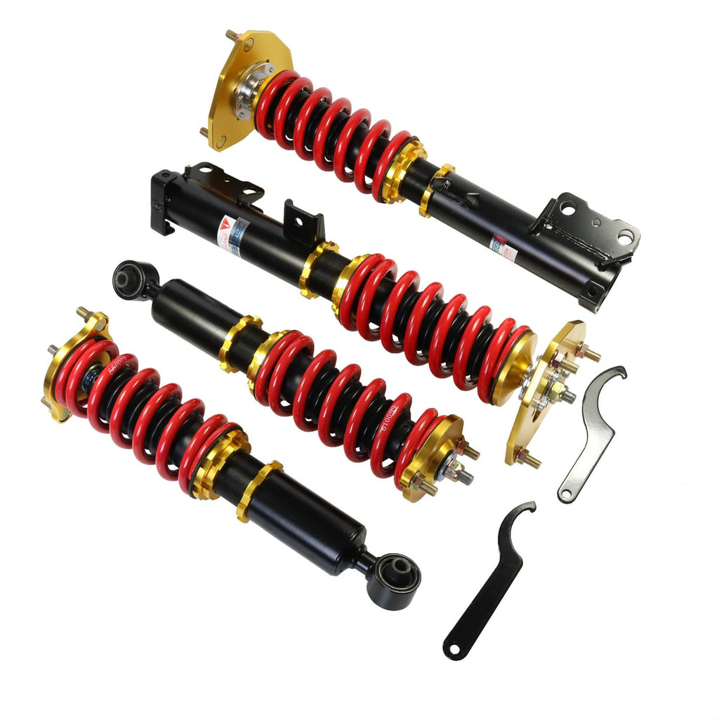 Adjustable coilovers with red spring coils, black dampers, gold top plates and brackets