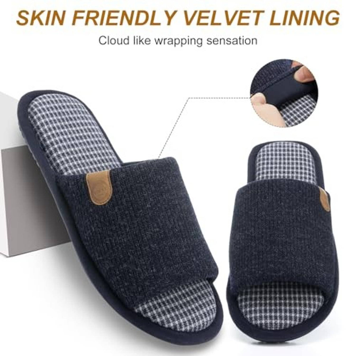 Men's navy memory foam slippers with plaid lining detail and tan badge on side