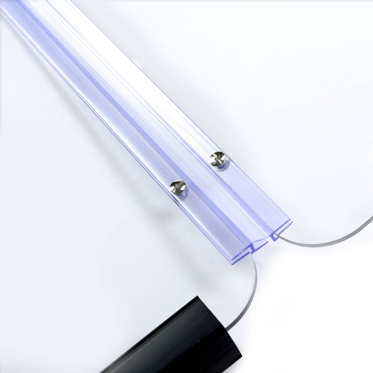 Clear windshield panel with blue metal rails and fastening screws