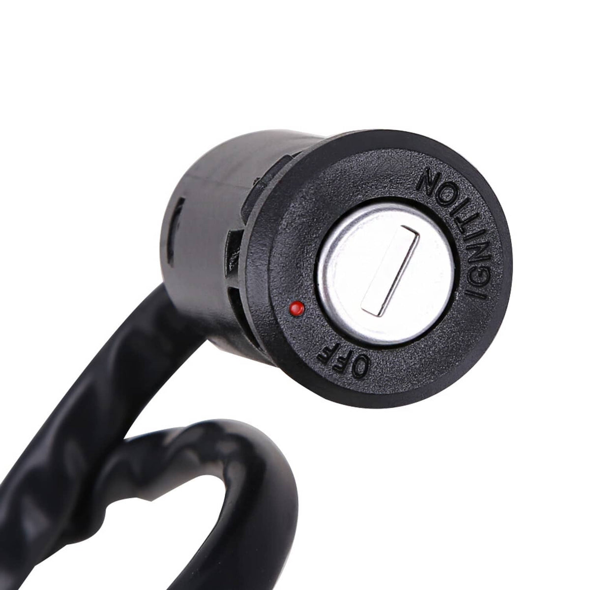 Black ignition key cylinder with metal key and red indicator dot