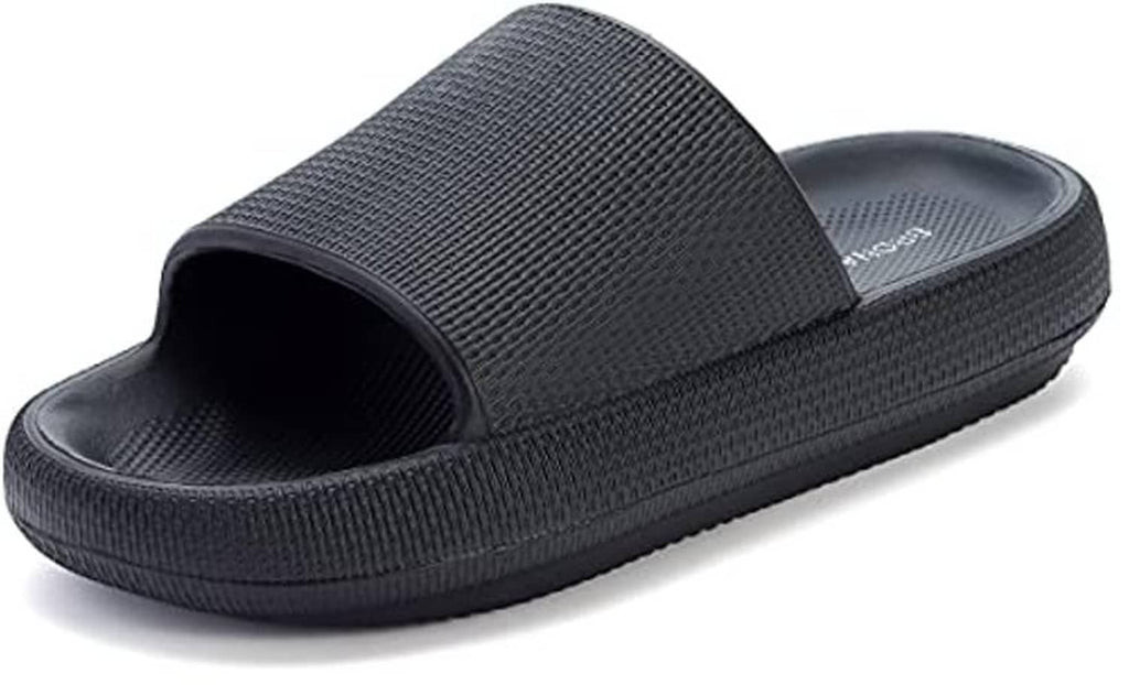 Black house slide slippers with textured upper strap and cushioned footbed.