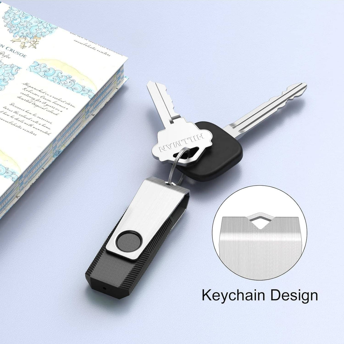 Silver and black USB flash drive with keychain loop and metal circular face