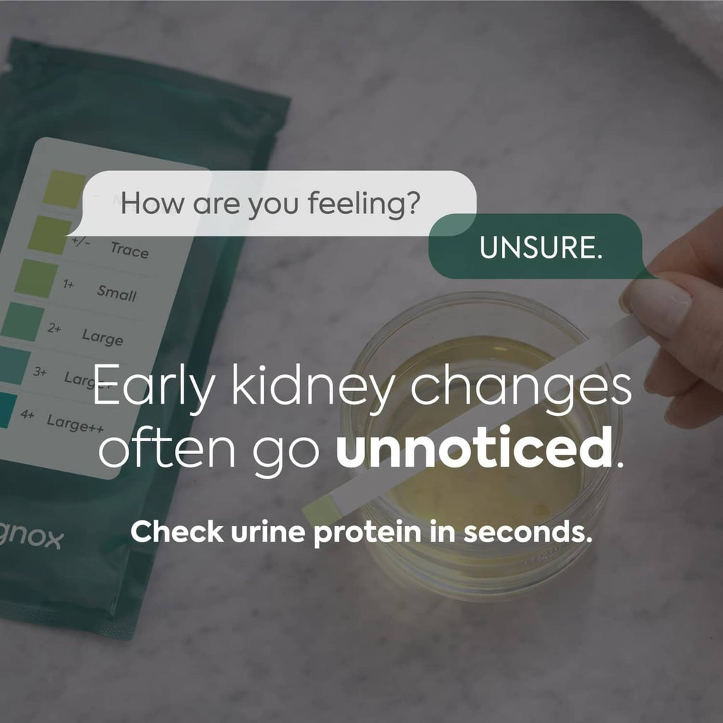 Urine protein test strips in pouch with strip held over a sample cup