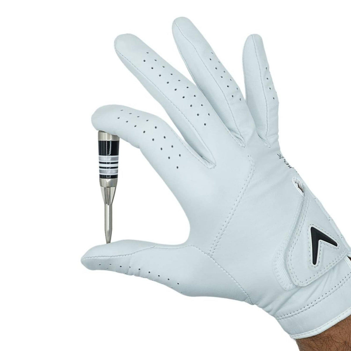 Golf divot tool shown with a white leather golf glove featuring stitched details