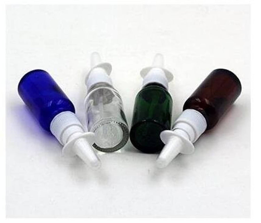Set of refillable nasal bottles: blue, clear, green, and amber glass with white pumps