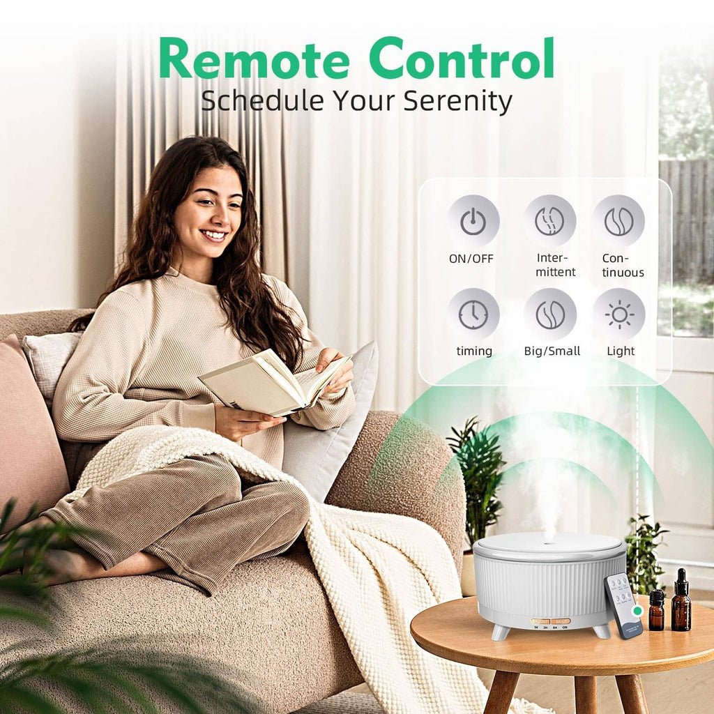 White essential oil diffuser with button control panel and remote-ready design.