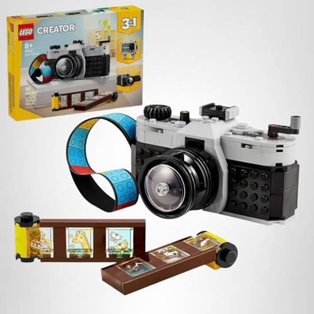 LEGO Creator retro camera toy set with box, lens, and multicolor strap