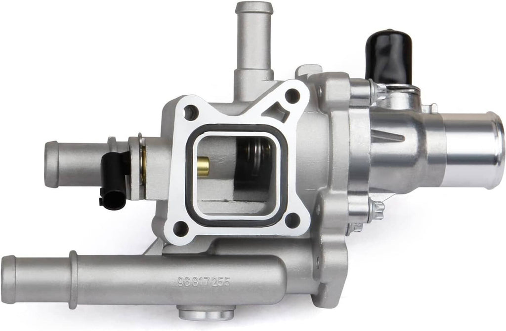 Thermostat housing assembly side view with square sensor port and black electrical cover.
