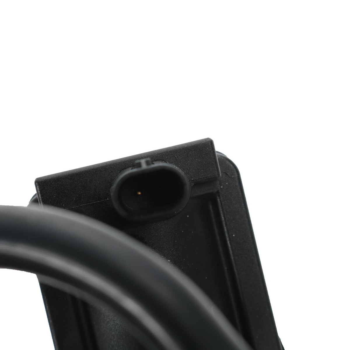 Close-up of turbocharger electrical plug connector on black housing