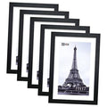 Set of 5 black poster picture frames, stacked front view with Eiffel Tower print