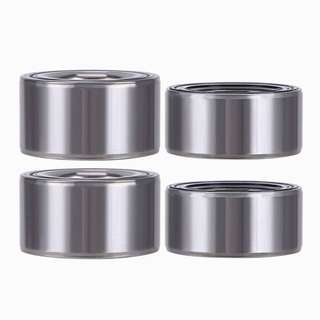 Four silver wheel bearing units with black sealing rings, displayed in a grid