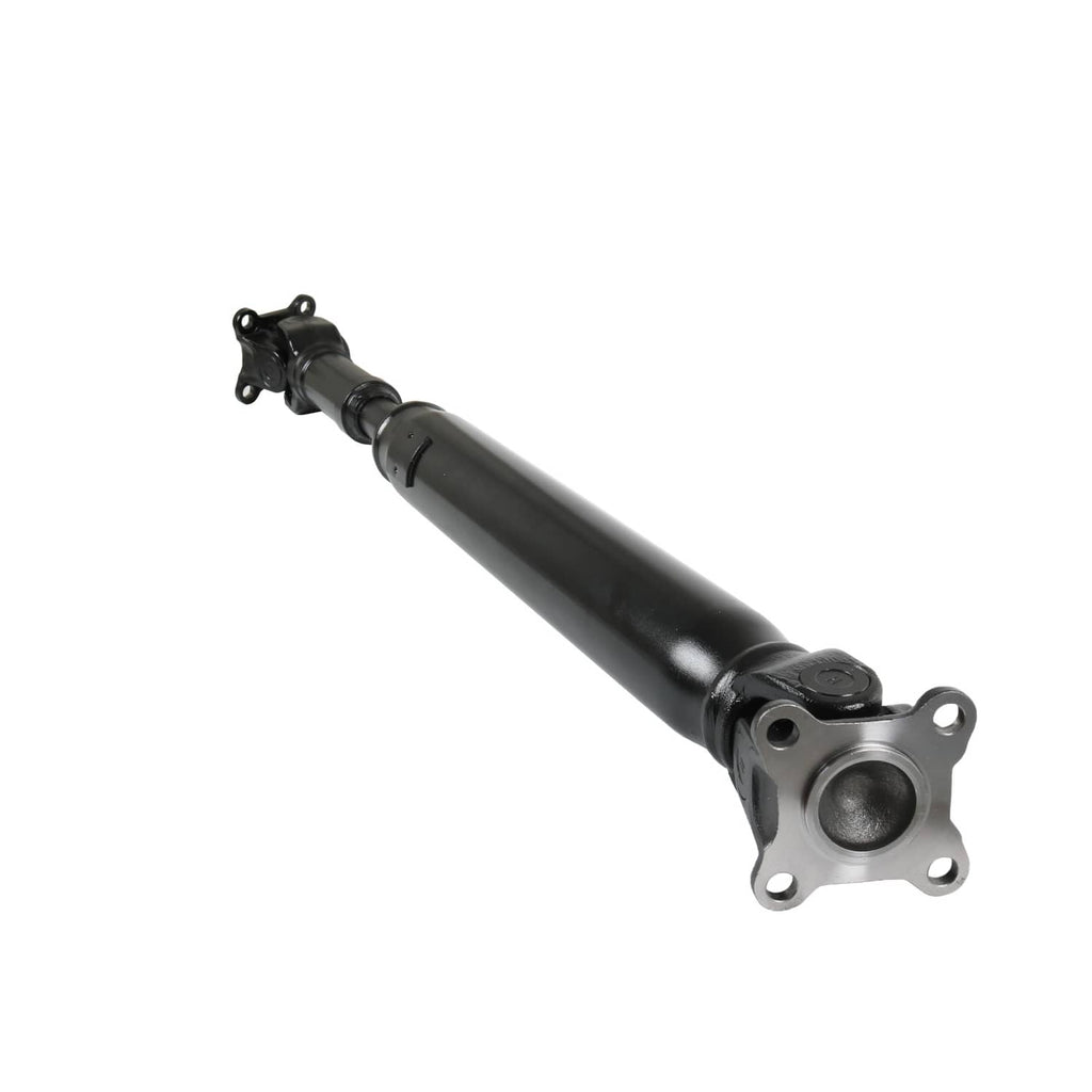 Front prop shaft assembly close-up, dark tube with round flange and bolt holes