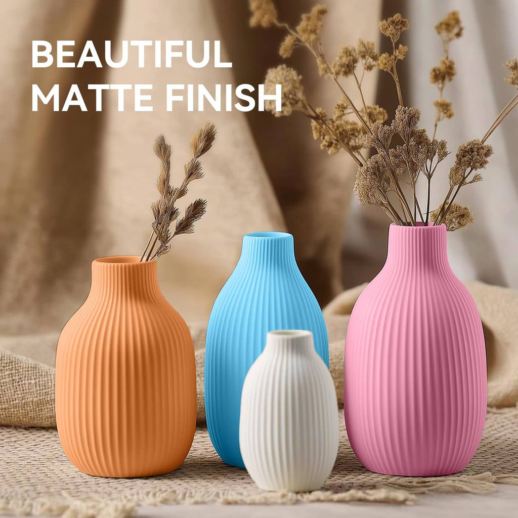 Matte PLA finish ribbed vases in orange, blue, pink, and white colors