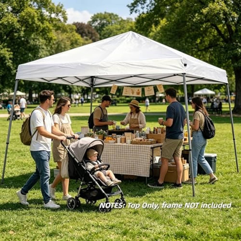 White canopy top cover over outdoor event with people shopping beneath