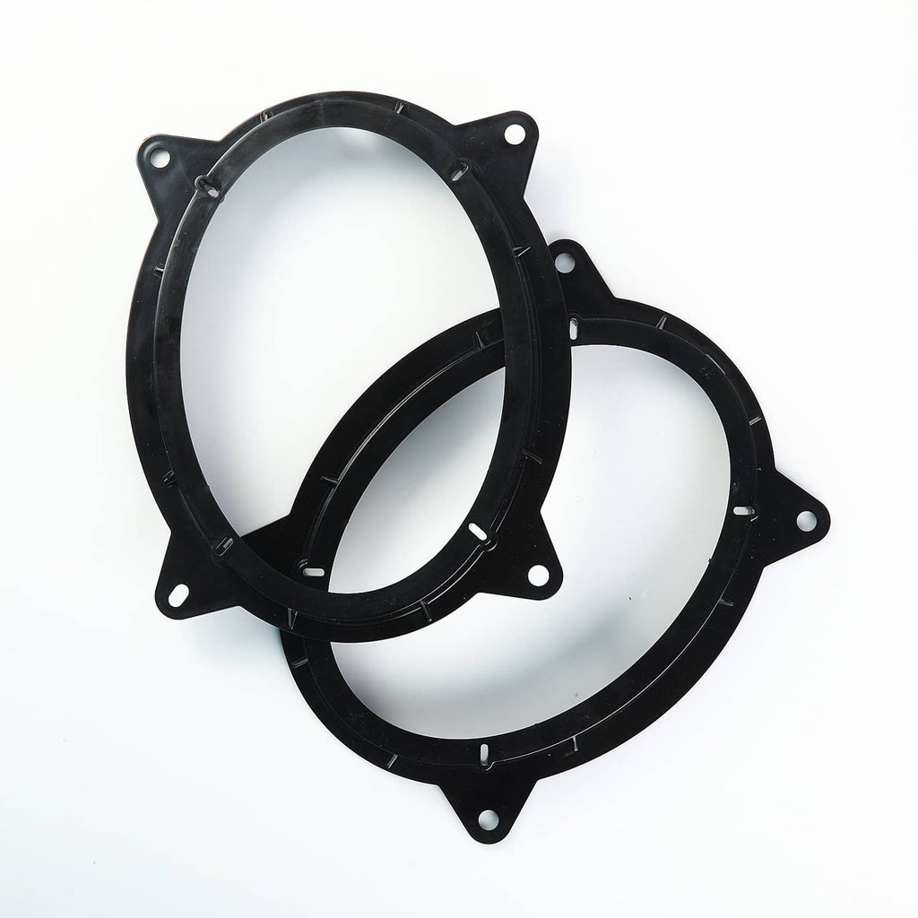 Pair of black 6x9 speaker adapter rings with mounting tabs and screw holes