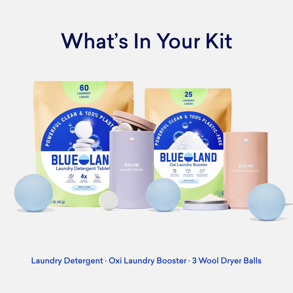 BLUELAND laundry essentials kit items laid out: detergent, Oxi booster, and dryer balls
