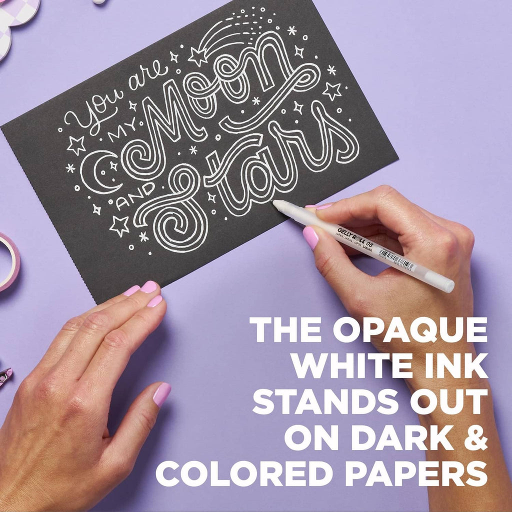 White opaque gel pen writing on dark colored paper swatch for standout text.