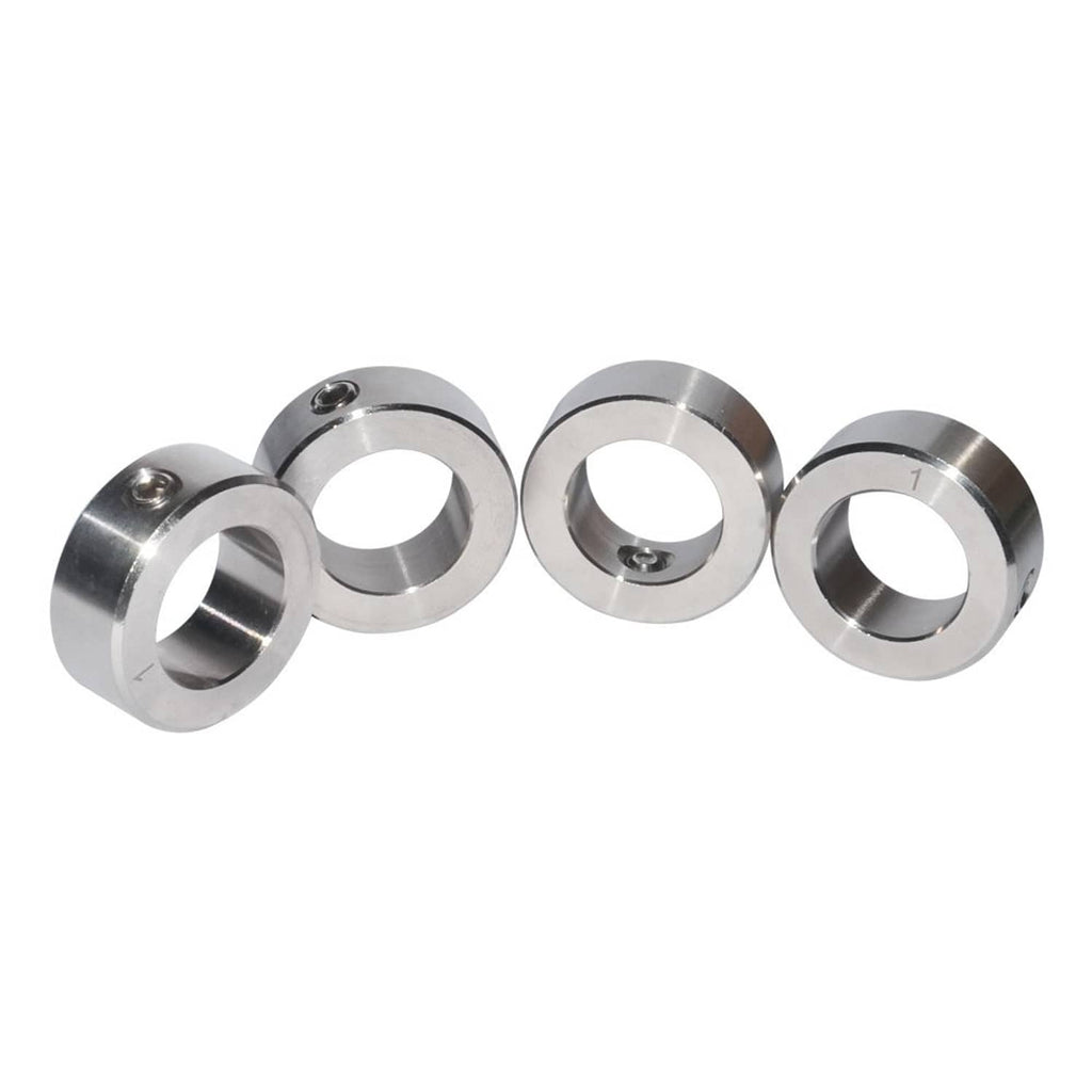 Four stainless steel shaft collars in a row, each with circular bore and set screw