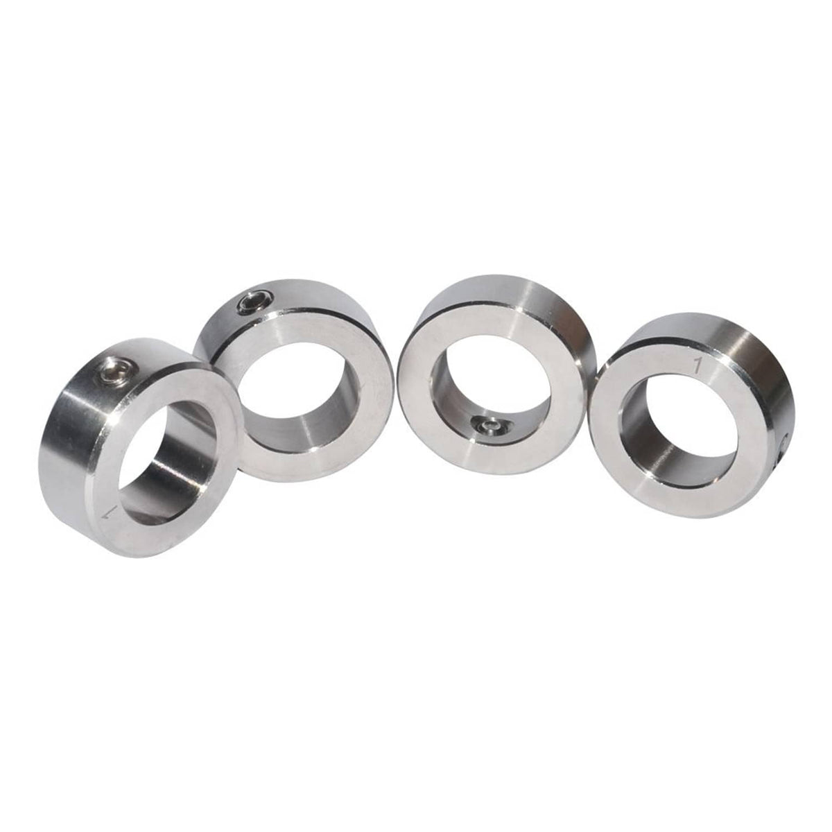 Four stainless steel shaft collars in a row, each with circular bore and set screw