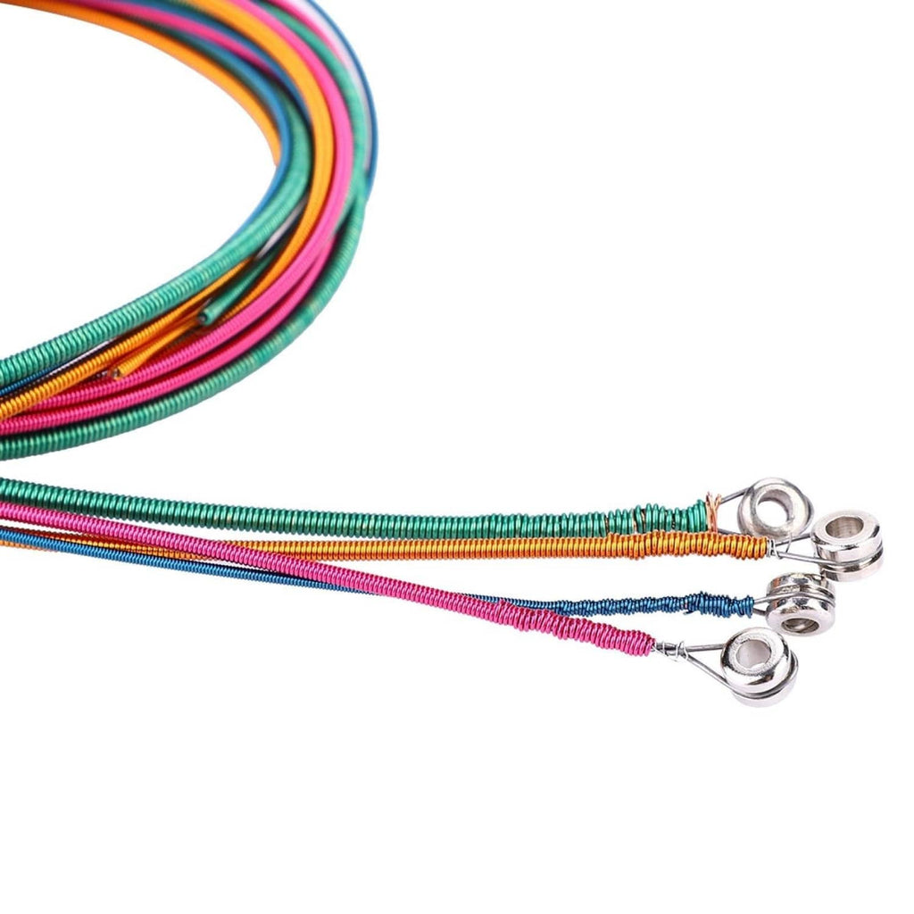 Close-up of multicolor steel bass string coils with silver tuning eyelets