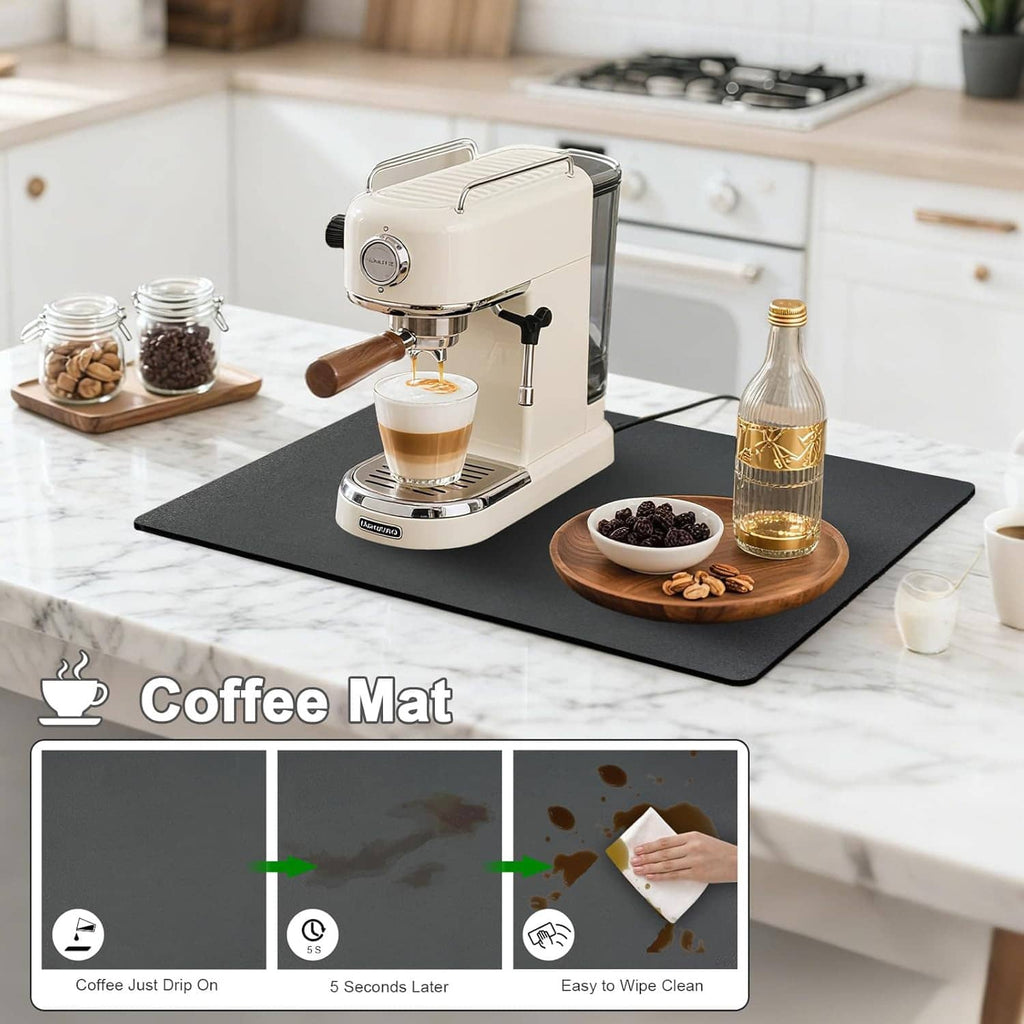 Black countertop mat for drying, shown with coffee machine, cups, and a bottle