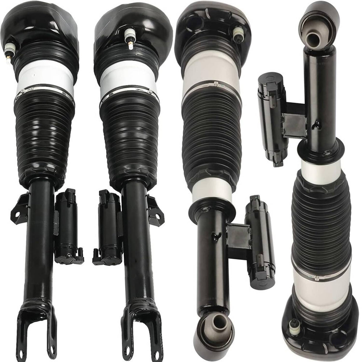Air suspension strut set close-up, black housings, white cylinders, and spring bellows