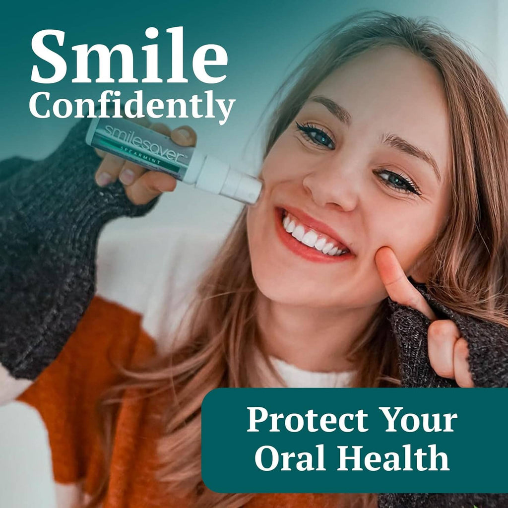 Smilesaver spray cleaner bottle held up beside a smiling woman