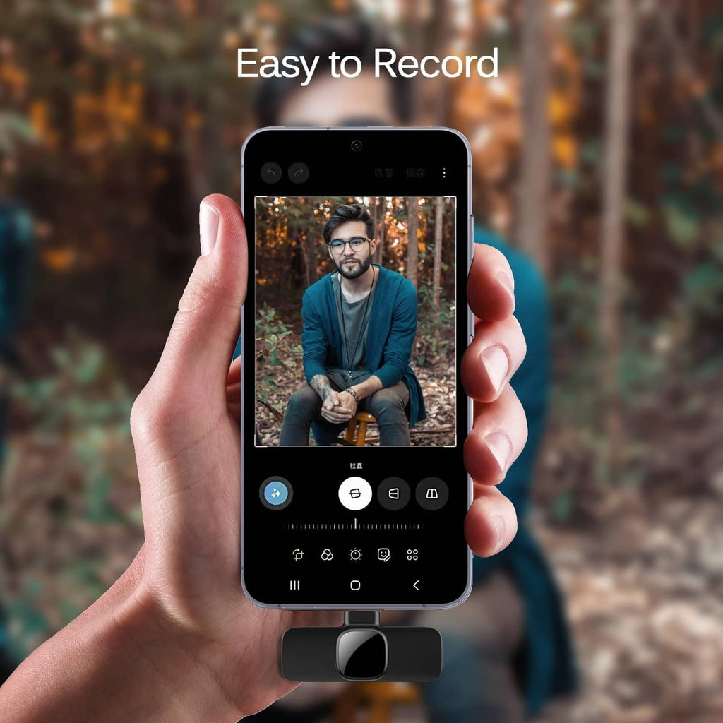 Wireless lavalier lapel microphone with furry windscreen clipped to a phone