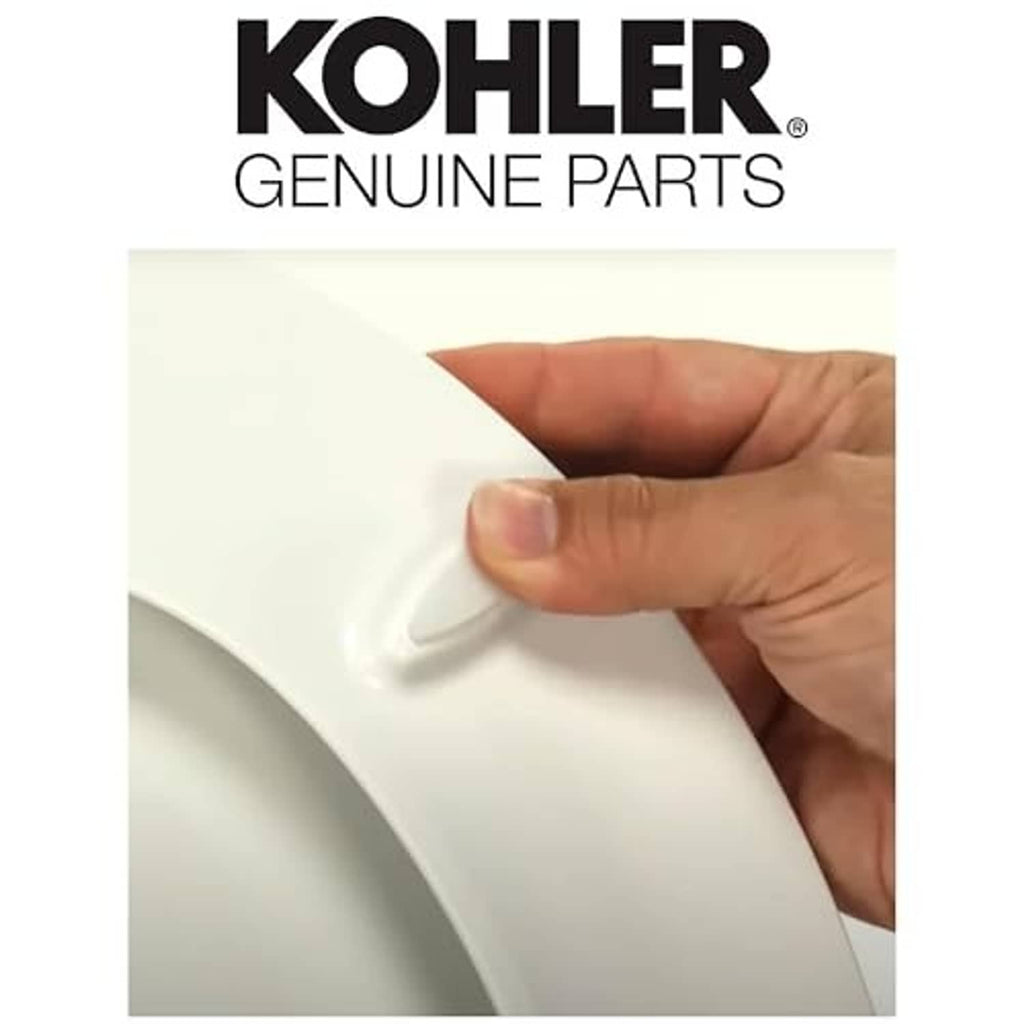 Hand positions a white Kohler bumper clip against a white toilet fixture