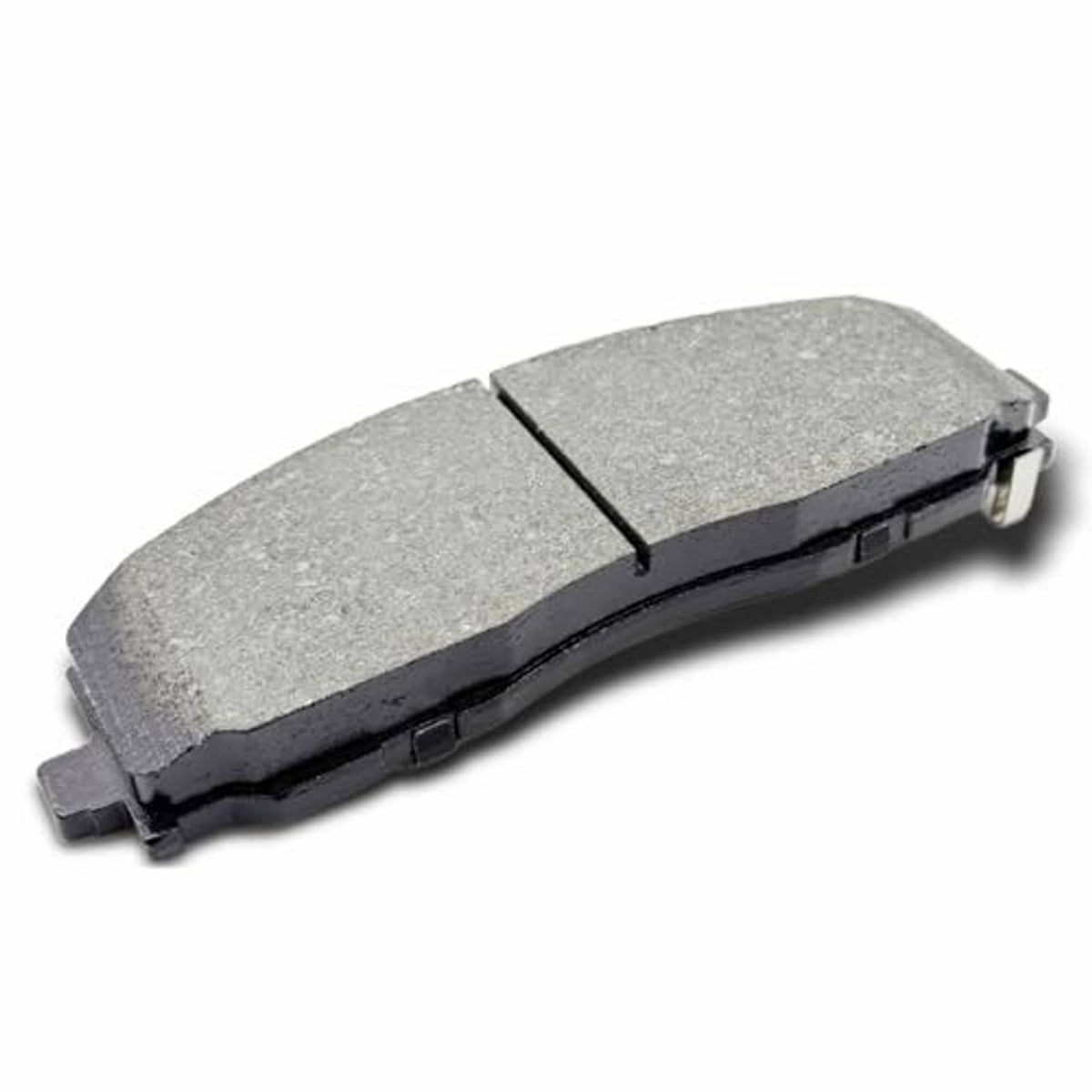 Ceramic brake pad with gray friction surface and black metal backing, angled side view