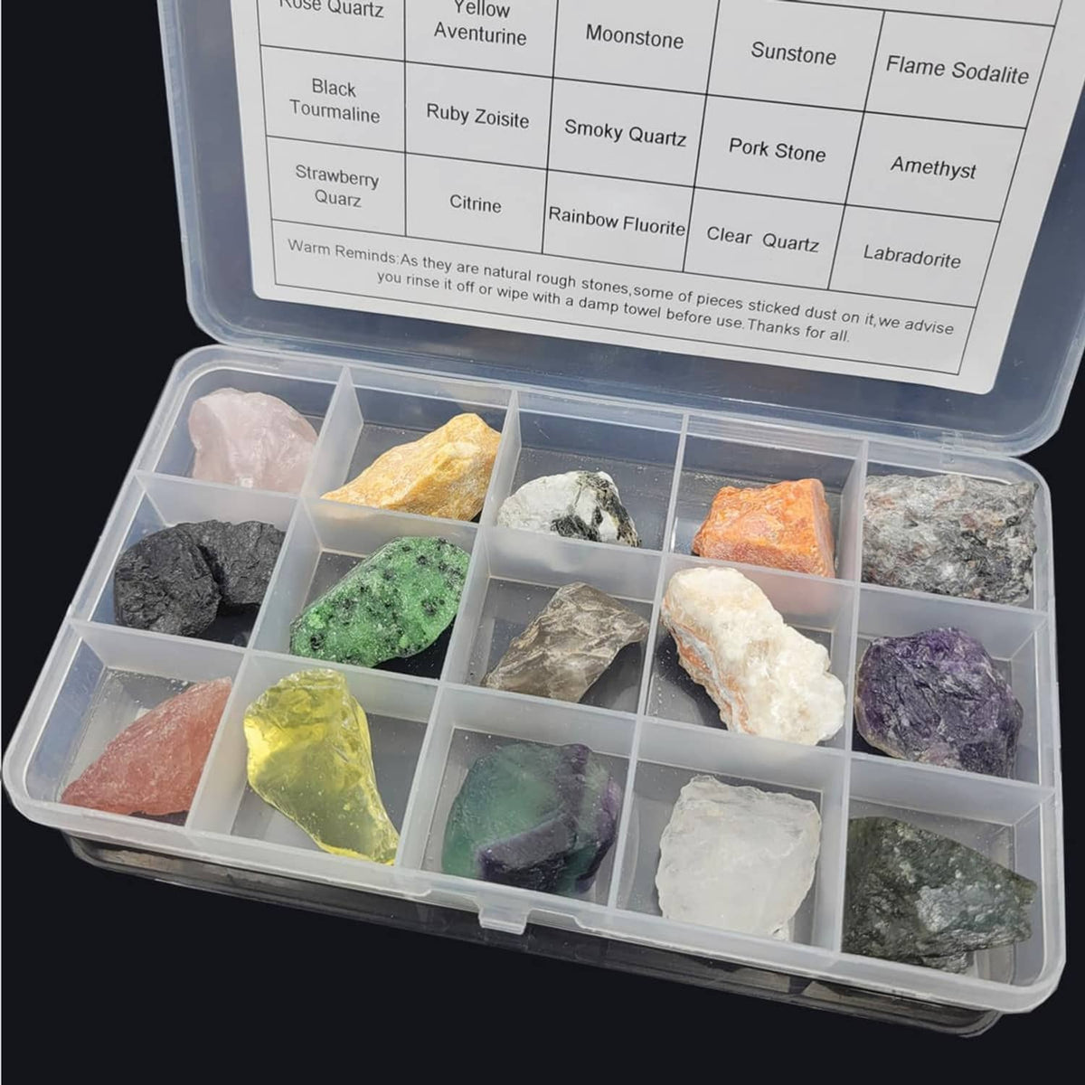 Rock tumbling rough stone specimen kit with labeled tray of mixed colorful rough stones