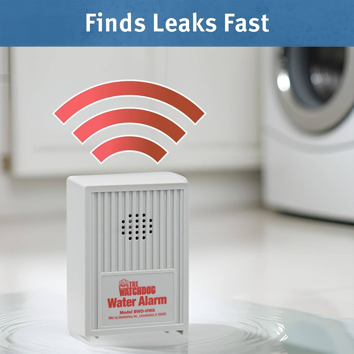 White water leak alarm placed on floor near appliance, front grille visible