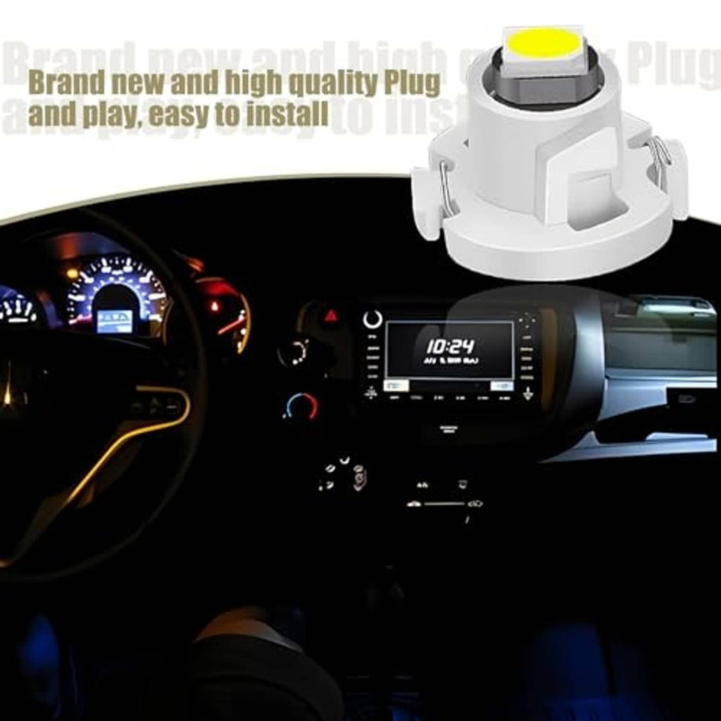 White plug-and-play LED wedge bulb with yellow LED lens in vehicle dashboard