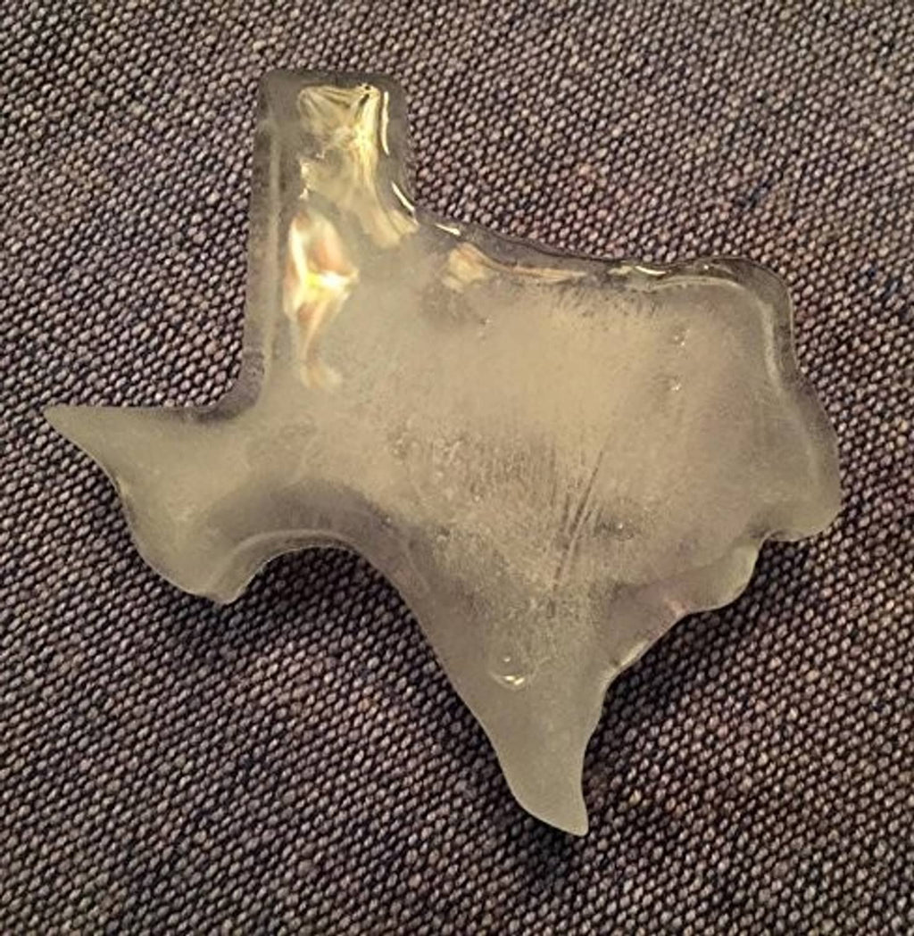 Texas-shaped molded piece in clear light material