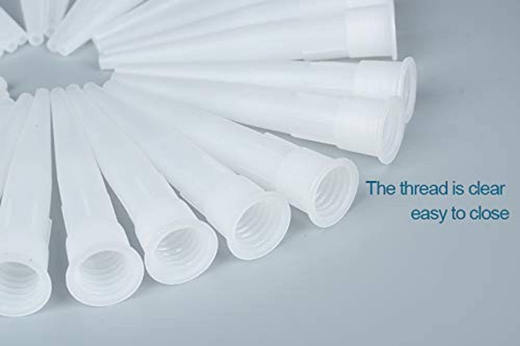 Multiple white plastic caulk nozzle tip extenders in a row