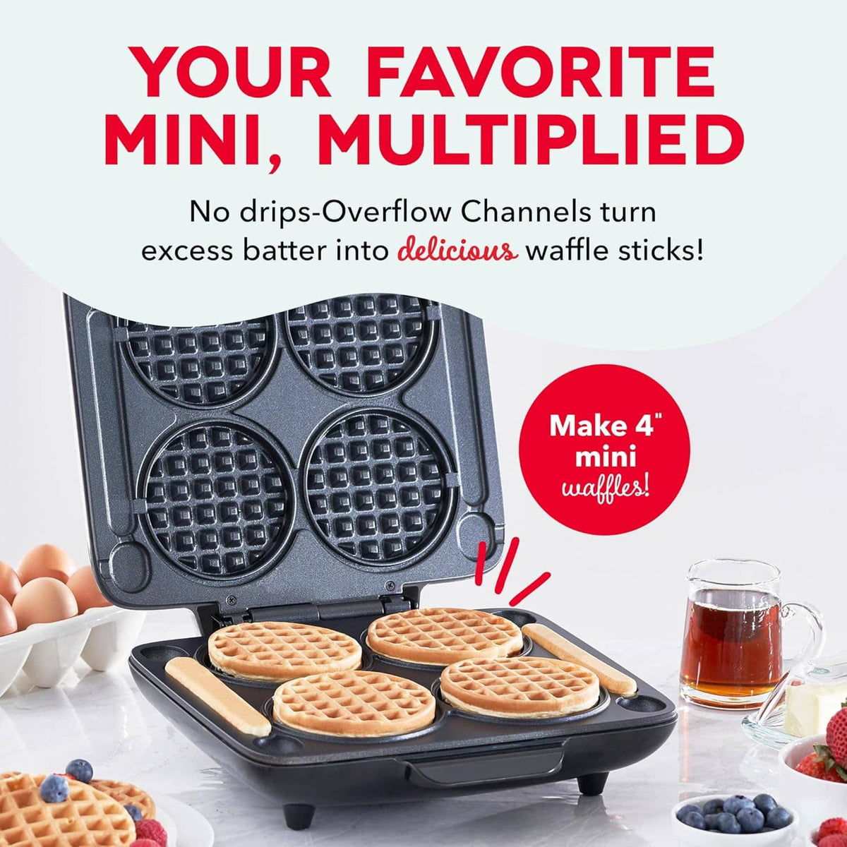 Graphite four-slot mini waffle maker with four golden waffles in the plates
